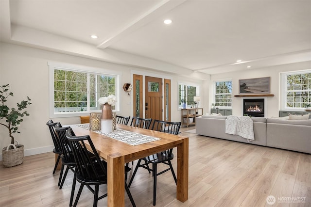 dining space with recessed lighting, baseboards, and light wood-style flooring