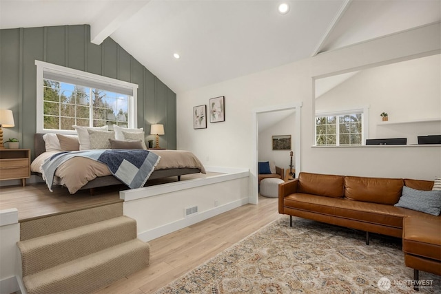 bedroom with recessed lighting, vaulted ceiling with beams, wood finished floors, and visible vents