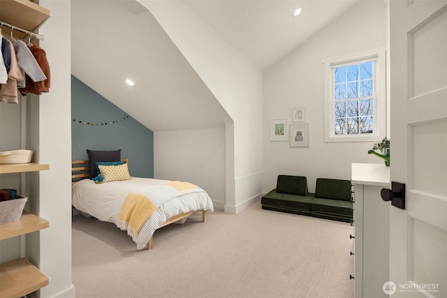 bedroom with vaulted ceiling, recessed lighting, baseboards, and carpet floors