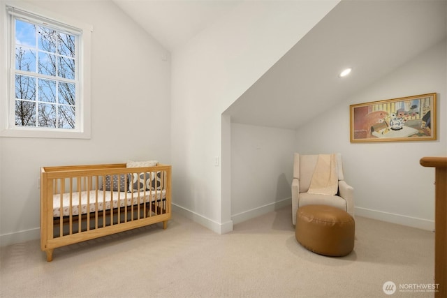 bedroom featuring baseboards, carpet floors, vaulted ceiling, recessed lighting, and a nursery area