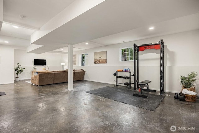 workout area with recessed lighting and baseboards