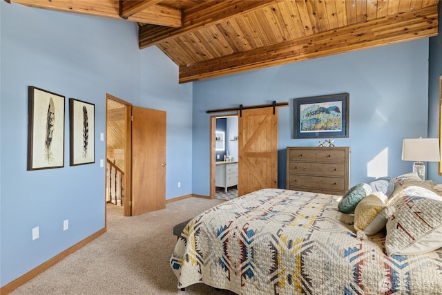 carpeted bedroom featuring wood ceiling, beam ceiling, baseboards, and a barn door