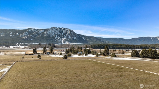 property view of mountains featuring a rural view