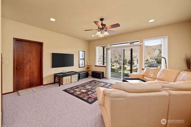 living room with carpet, baseboards, ceiling fan, and recessed lighting