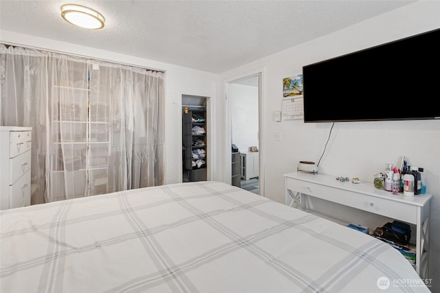 bedroom with a textured ceiling