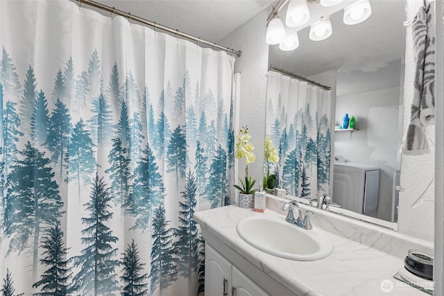 full bath with a shower with curtain, a textured ceiling, vanity, and a textured wall