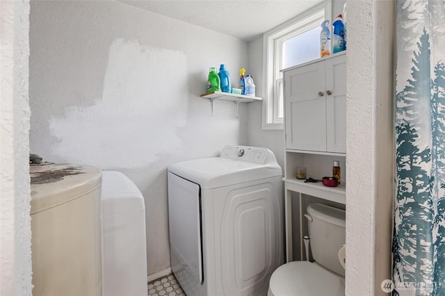 laundry room featuring washer and dryer and laundry area