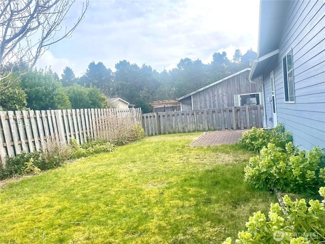 view of yard featuring a fenced backyard