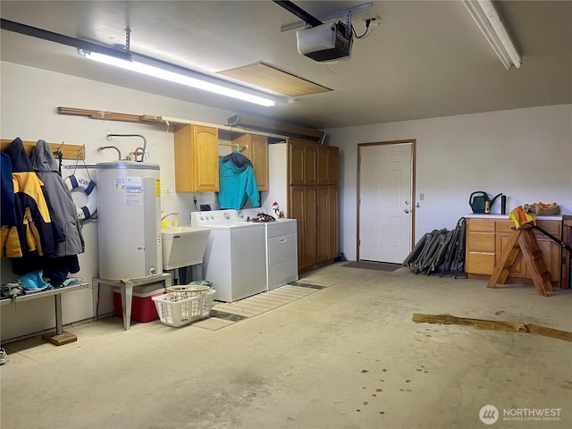 garage with a sink, electric water heater, washer and dryer, and a garage door opener