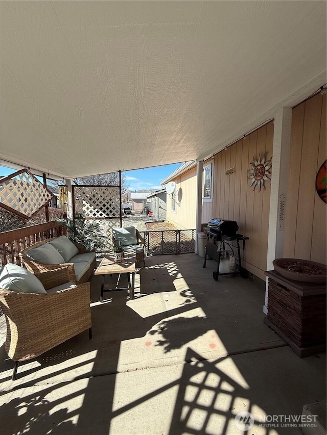 view of patio featuring a grill and outdoor lounge area