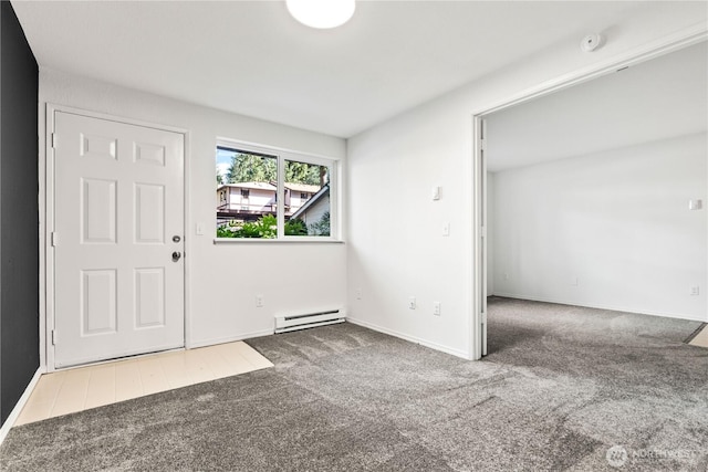 interior space featuring baseboards and baseboard heating