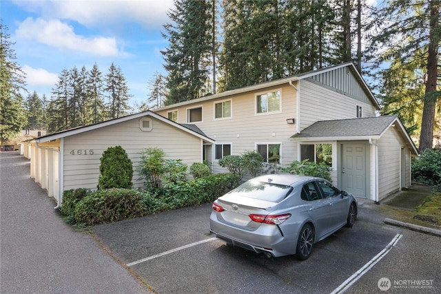 view of front of house with uncovered parking