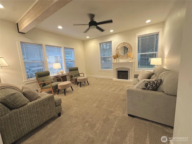 living area featuring ceiling fan, beamed ceiling, carpet flooring, a fireplace, and recessed lighting