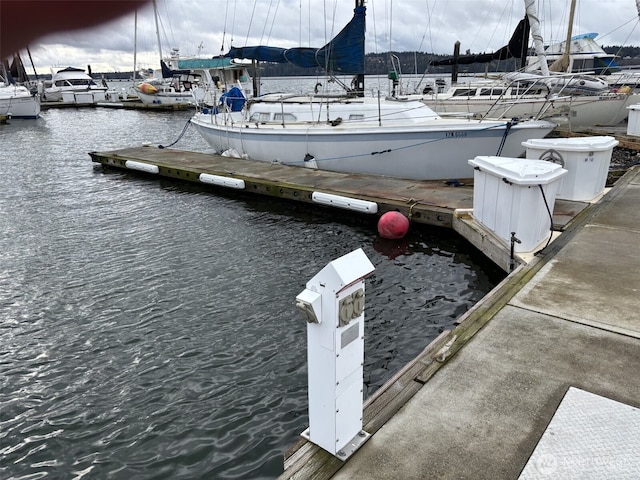 view of dock with a water view