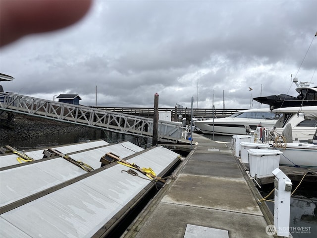 dock area featuring a water view