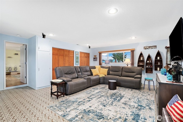 living area featuring recessed lighting