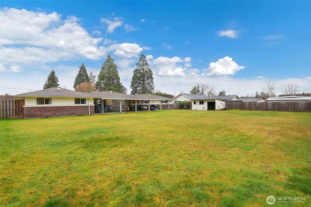 view of yard with fence