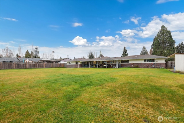 view of yard with fence