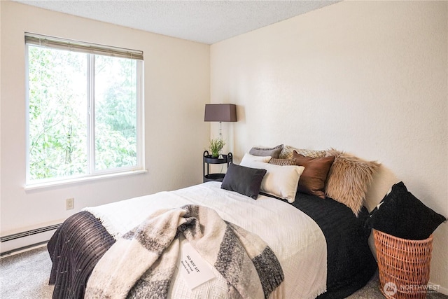 carpeted bedroom featuring a textured ceiling, multiple windows, and a baseboard radiator