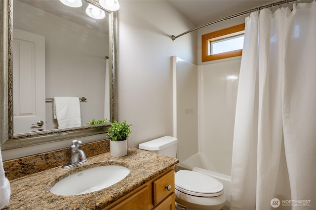 bathroom with shower / tub combo, vanity, and toilet