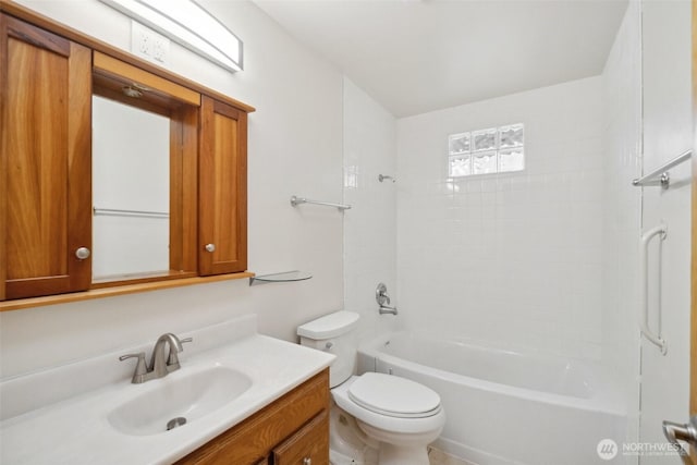 full bathroom with tub / shower combination, toilet, and vanity