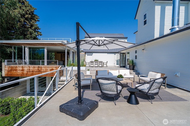 view of patio / terrace with outdoor lounge area and outdoor dining space