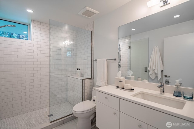 bathroom with visible vents, walk in shower, toilet, recessed lighting, and vanity