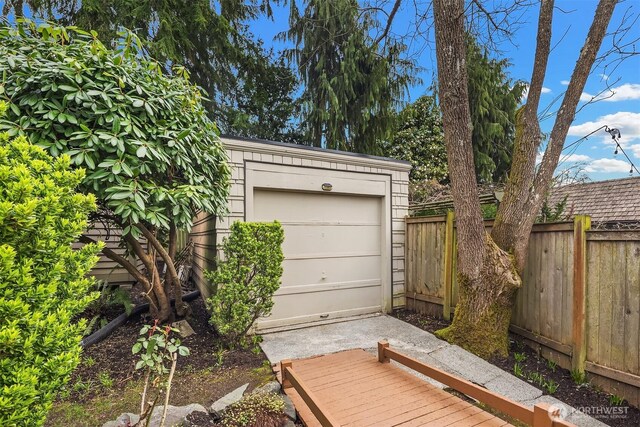 garage with fence