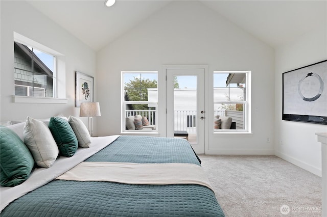 carpeted bedroom featuring access to outside, high vaulted ceiling, and baseboards