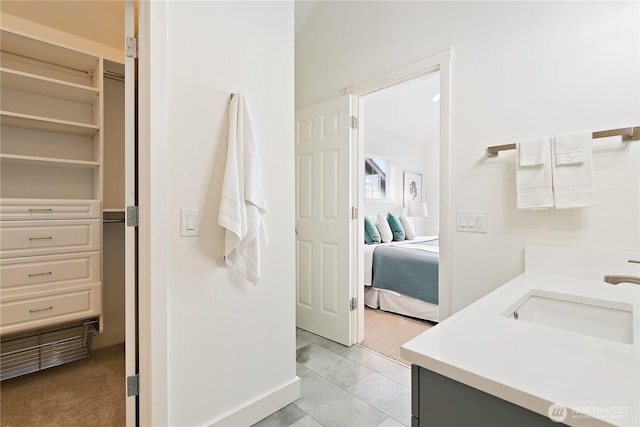 bathroom with ensuite bath and vanity