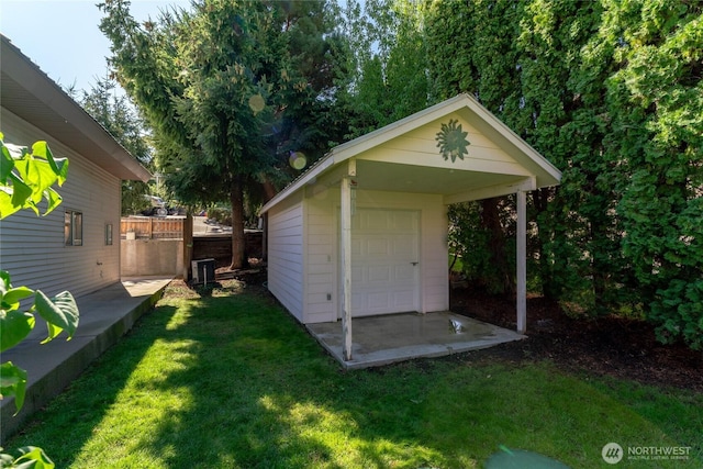 view of outdoor structure with an outdoor structure and fence