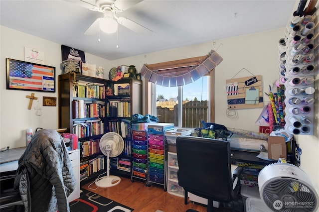 home office featuring a ceiling fan and wood finished floors