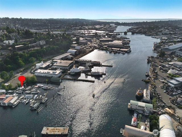 birds eye view of property featuring a water view