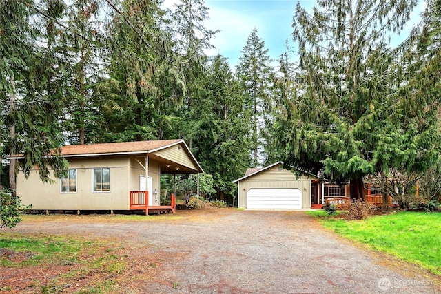 view of front of home with a garage and driveway