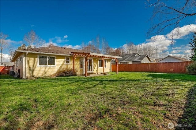 back of house with a lawn, cooling unit, a pergola, and fence