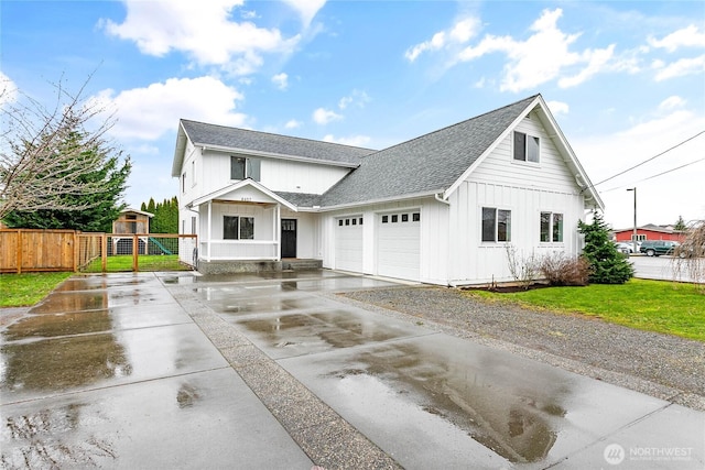 modern farmhouse style home featuring driveway, fence, roof with shingles, board and batten siding, and a garage