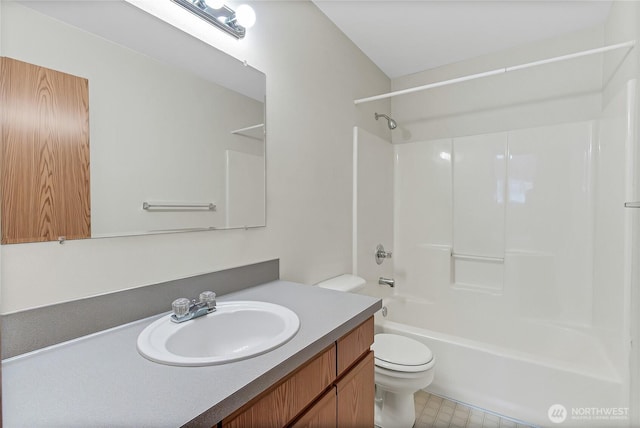 full bath featuring washtub / shower combination, vanity, and toilet