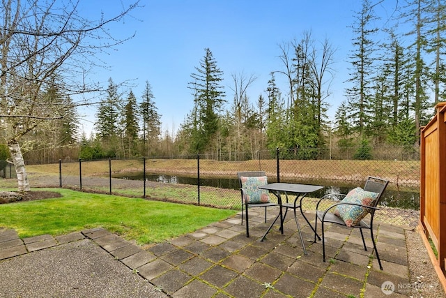 view of patio / terrace with outdoor dining area and a fenced backyard