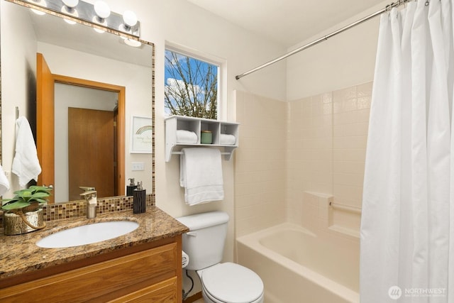 full bathroom with shower / bath combination with curtain, backsplash, vanity, and toilet