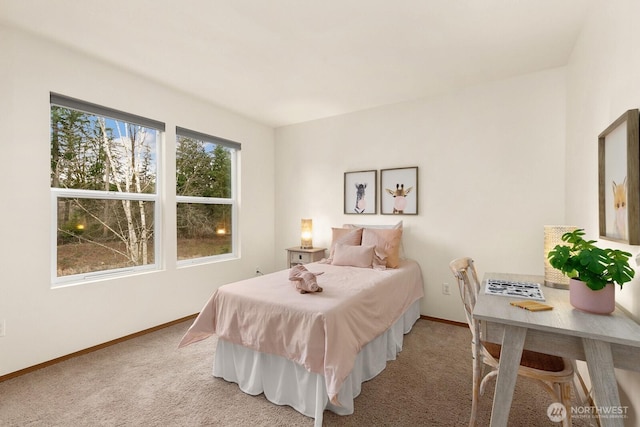 carpeted bedroom with baseboards