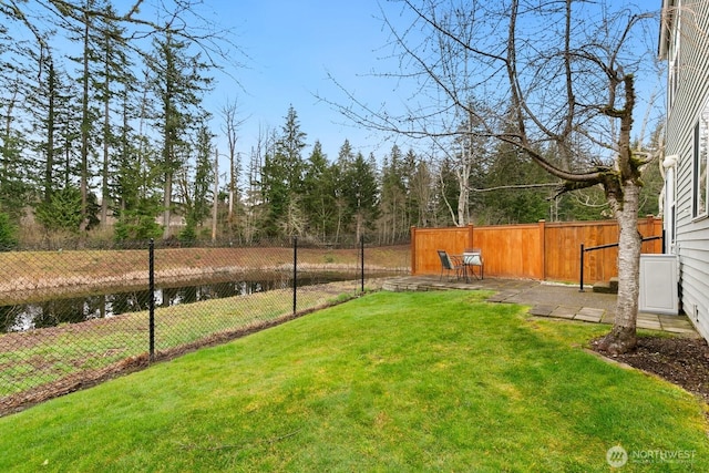 view of yard featuring a fenced backyard and a patio