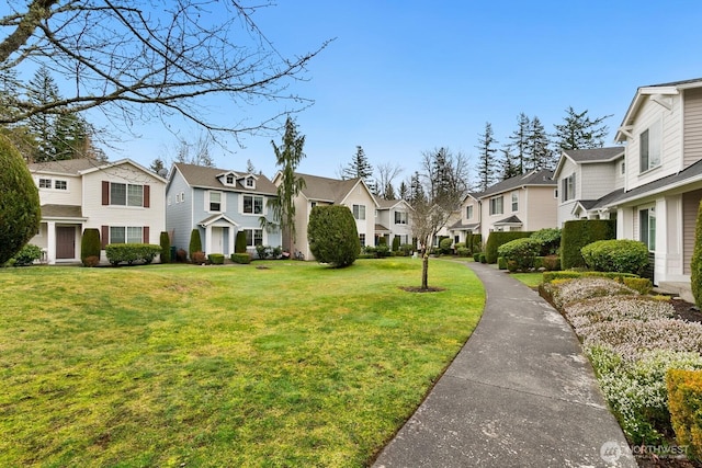 view of yard featuring a residential view