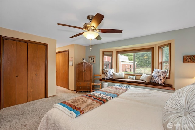 bedroom with light carpet and ceiling fan