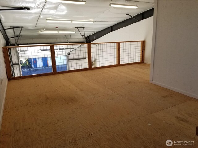 interior space with tile patterned floors and baseboards