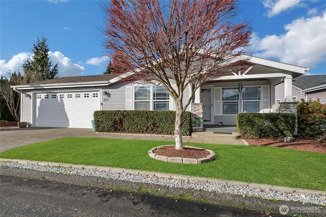 view of front facade featuring aphalt driveway, a front lawn, and an attached garage