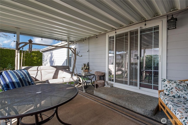 view of patio featuring outdoor dining area