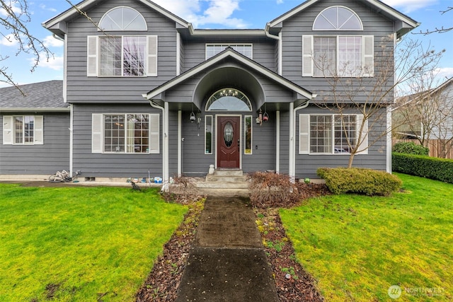 view of front of property with a front yard