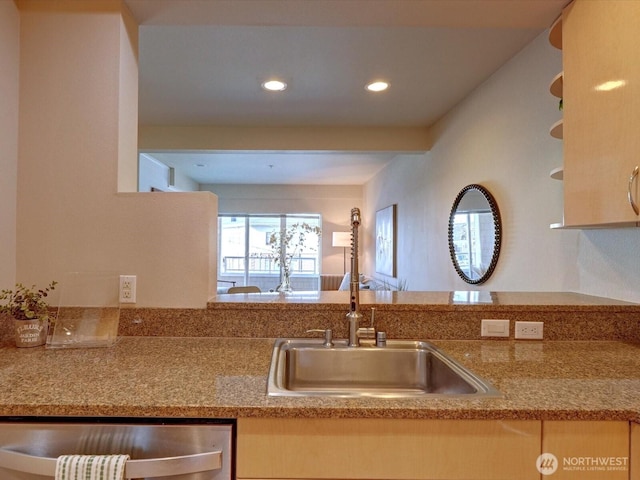 kitchen with open shelves, stainless steel dishwasher, a sink, and recessed lighting