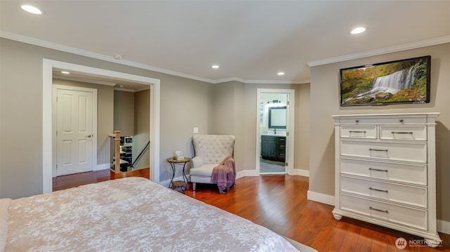 bedroom with dark wood-type flooring, recessed lighting, crown molding, and baseboards