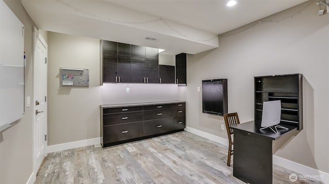 interior space featuring light wood-style floors, recessed lighting, visible vents, and baseboards